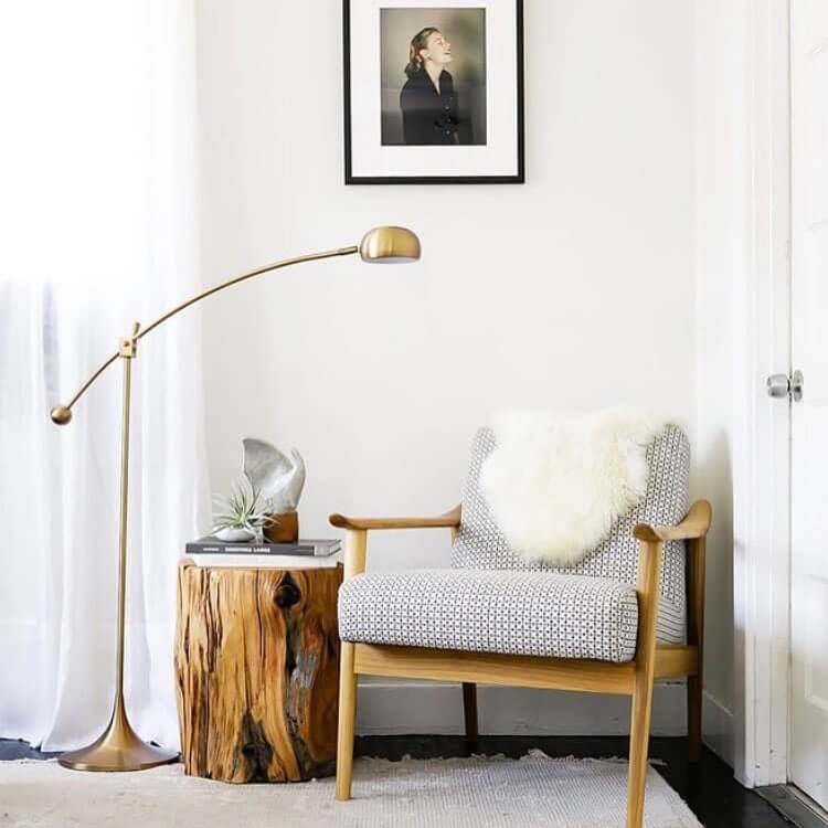 Balanced furniture and frame elements in a living room corner